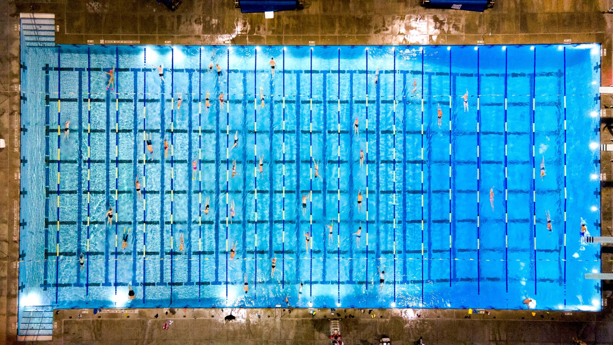 Drone photo of the pool while master swimmers workout.