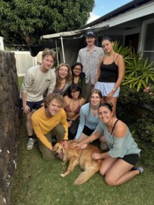 Team petting a dog 