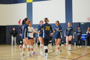 Players high five each other