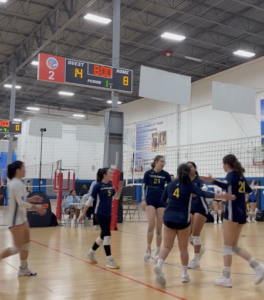 Players high five each other