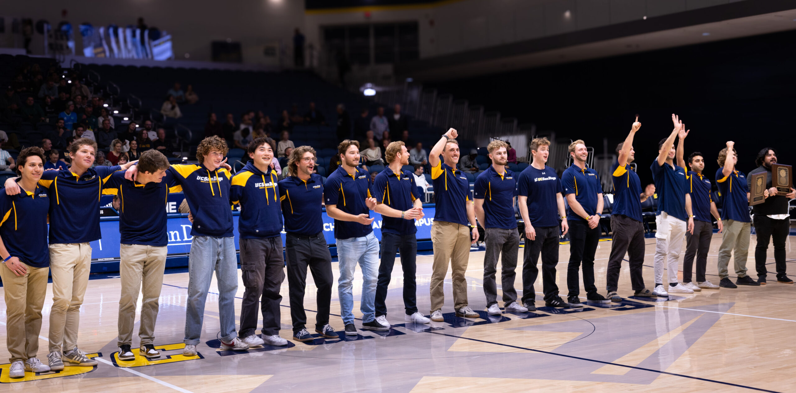 Several student-athletes from the 2023 national championship team were recognized, center court, at halftime of the UC San Diego men's basketball game against UCSB.