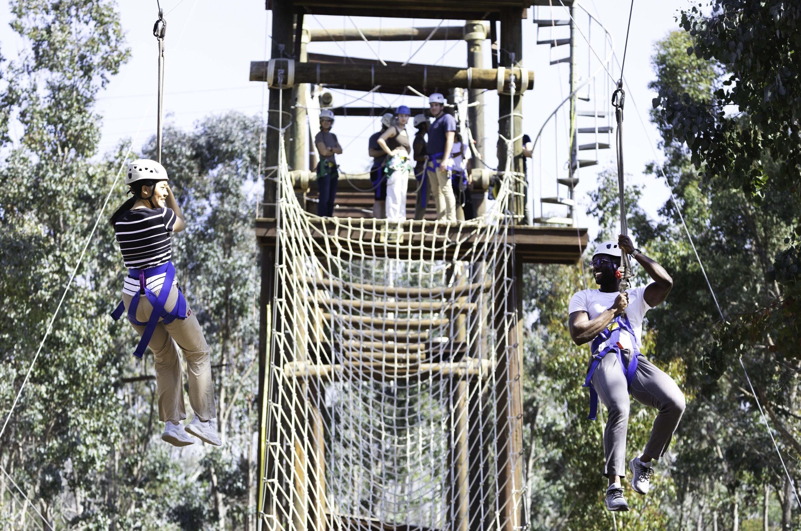 ChallengeCourse_SmilingPair2_Zipline_Horizontal-low